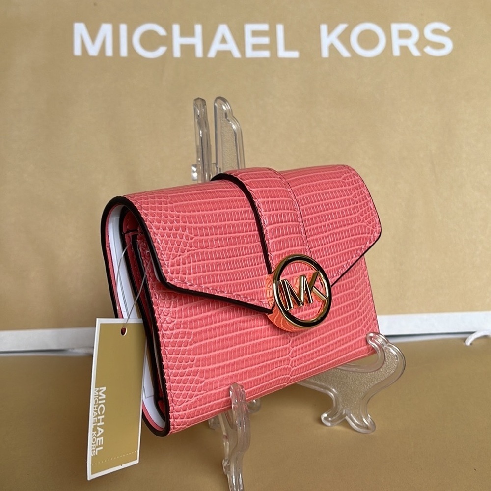 MICHAEL KORS CARMEN MEDIUM FLAP LOGO BIFOLD WALLET GRAPEFRUIT
